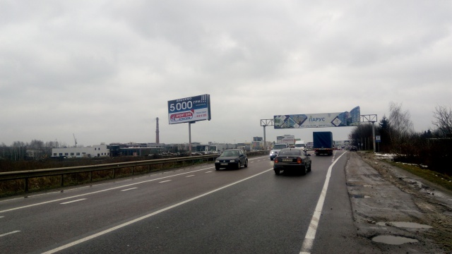 Щит 6x3,  Кільцева дорога, 150 м до в'їзду в автосалони "BMW", "HONDA", "Volkswagen & Seat" (Гіпермарткет "Епіцентр", Гіпермаркет "МЕТРО", АЗС "БРСМ-нафта"), в напрямку Городоцька вул.