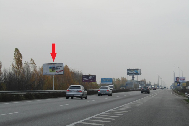 Щит 6x3,  Житомирське шосе , в напрямку м.Київ, перед с.Міла ( після заправки "UPG"),7км+700м