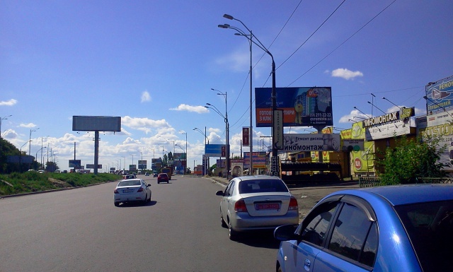 Щит 6x3,  Кільцева дорога, навпроти Зодчих вул., (ТЦ "Апрель") , в напрямку Одеської пл.